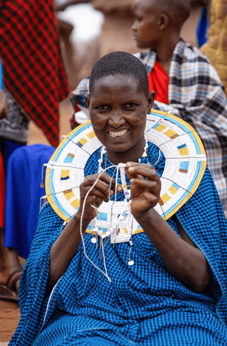 Indigenous women creating a jewelry